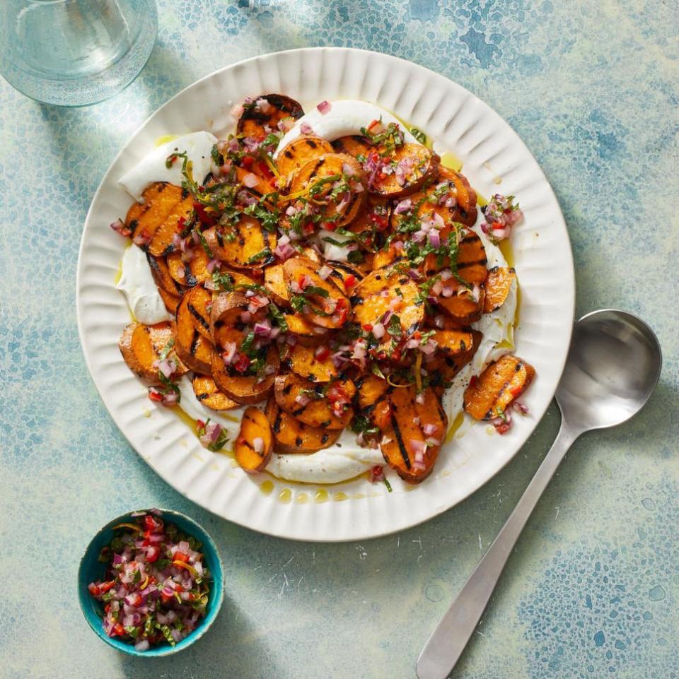 <p>A fiery, fragrant chile and mint relish is the perfect topper to perk up these smoky grilled sweet potatoes.</p><p><em><a href="https://www.goodhousekeeping.com/food-recipes/a32097162/grilled-sweet-potatoes-recipe/" rel="nofollow noopener" target="_blank" data-ylk="slk:Get the recipe for Grilled Sweet Potatoes With Lemon-Herb Sauce »;elm:context_link;itc:0;sec:content-canvas" class="link ">Get the recipe for Grilled Sweet Potatoes With Lemon-Herb Sauce »</a></em></p><p><strong>RELATED: </strong><a href="https://www.goodhousekeeping.com/food-recipes/g413/great-grilling-recipes/" rel="nofollow noopener" target="_blank" data-ylk="slk:60+ Grill Recipes That Will Be Your New Summer Favorites;elm:context_link;itc:0;sec:content-canvas" class="link ">60+ Grill Recipes That Will Be Your New Summer Favorites</a> </p>