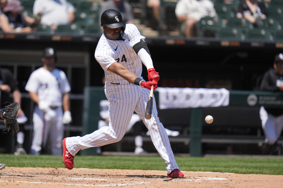 Chicago White Sox designated hitter Eloy Jiménez hits a single during the fifth inning of a baseball game against the Minnesota Twins, Wednesday, July 10, 2024, in Chicago. (AP Photo/Erin Hooley)