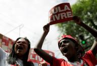 Supporters of former Brazilian President Luiz Inacio Lula da Silva wait for his arrival after he was released from prison, in Sao Bernardo do Campo