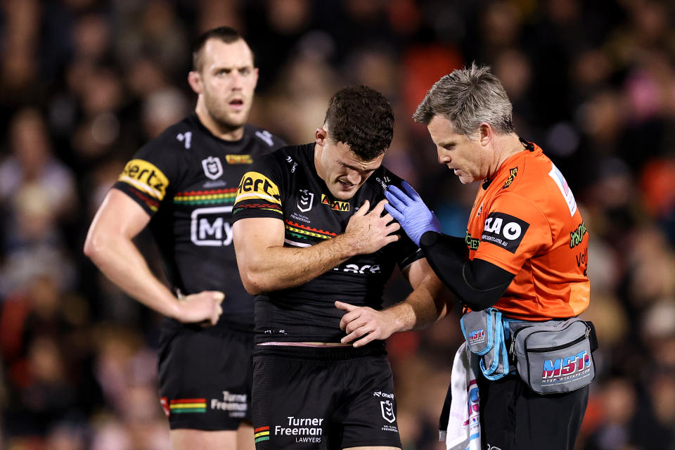 PENRITH, AUSTRALIA - AUGUST 15: Nathan Cleary of the Panthers holds his shoulder during the round 24 NRL match between Penrith Panthers and Melbourne Storm at BlueBet Stadium, on August 15, 2024, in Penrith, Australia. (Photo by Brendon Thorne/Getty Images)