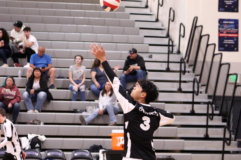 Junior Trinity Fesuluai gets set to serve the ball to Douglas County on April 29, 2022.