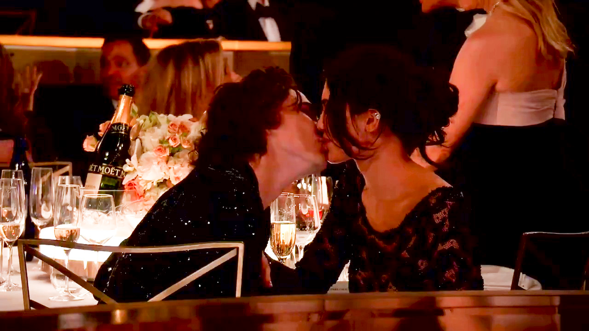 The couple shared a kiss at the event (CBS)