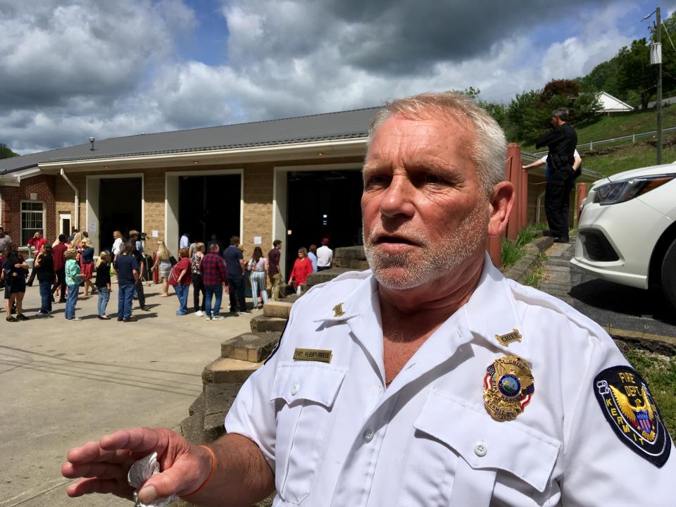 In this May 10, 2019 photo, Kermit, W.Va., volunteer fire chief Tommy Preece speaks outside of his fire station in Kermit, W.Va. Preece lost his brother to a drug overdose in 2017. He said he doesn't need to see federal drug data on prescription painkillers to know his area's history of drug problems. "I've seen so much of it, it's unreal," he said. (AP Photo/John Raby)