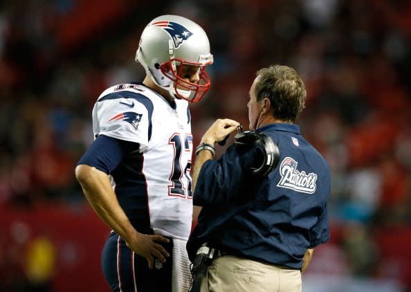 ATLANTA, GA - SEPTEMBER 29:  Tom Brady #12 of the New England Patriots converses with head coach Bill Belichick during the game against the Atlanta Falcons at Georgia Dome on September 29, 2013 in Atlanta, Georgia.  (Photo by Kevin C. Cox/Getty Images)