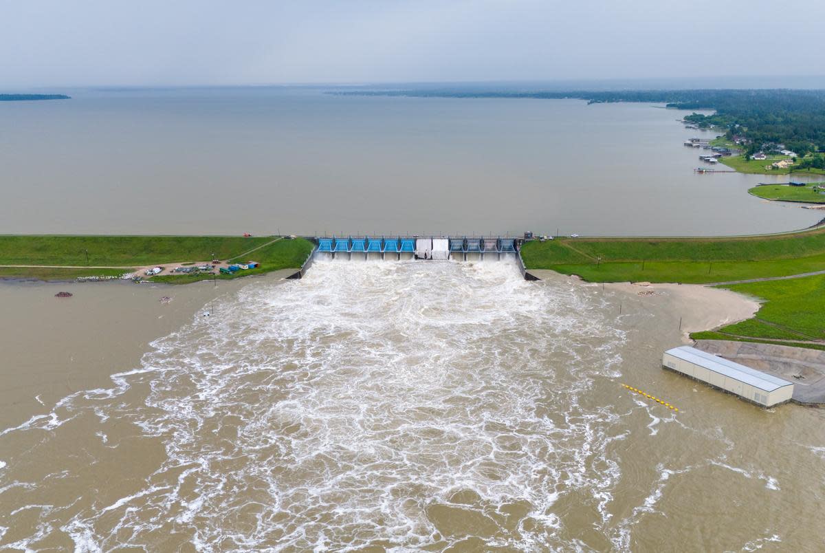 The Lake Livingston Dam is seen releasing water on May 3, 2024, in Livingston. The Southeast Texas reservoir reached capacity during several days of intense rainstorms this week.