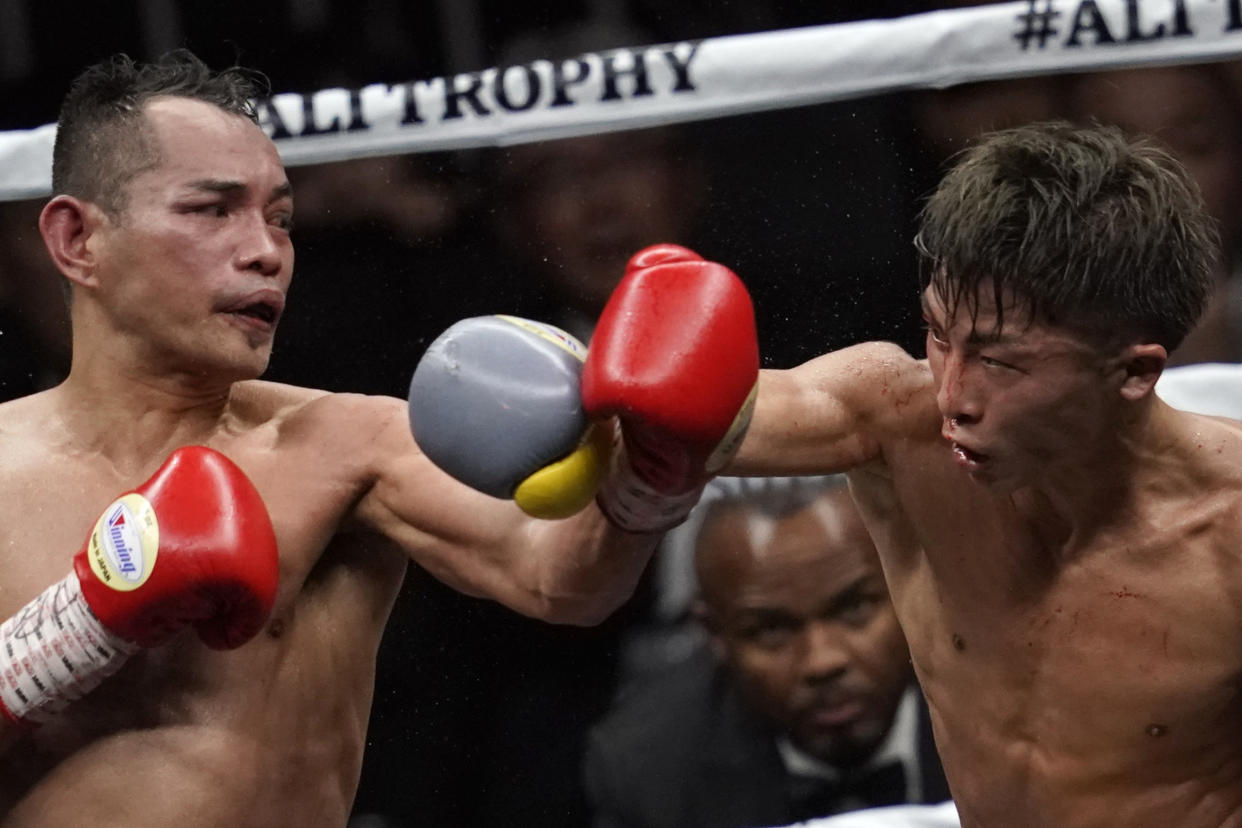 SAITAMA, JAPAN - NOVEMBER 07: Naoya Inoue (R) of Japan competes against Nonito Donaire of the Philippines during the WBSS Bantamweight Final at Saitama Super Arena on November 07, 2019 in Saitama, Japan. (Photo by Toru Hanai/Getty Images)