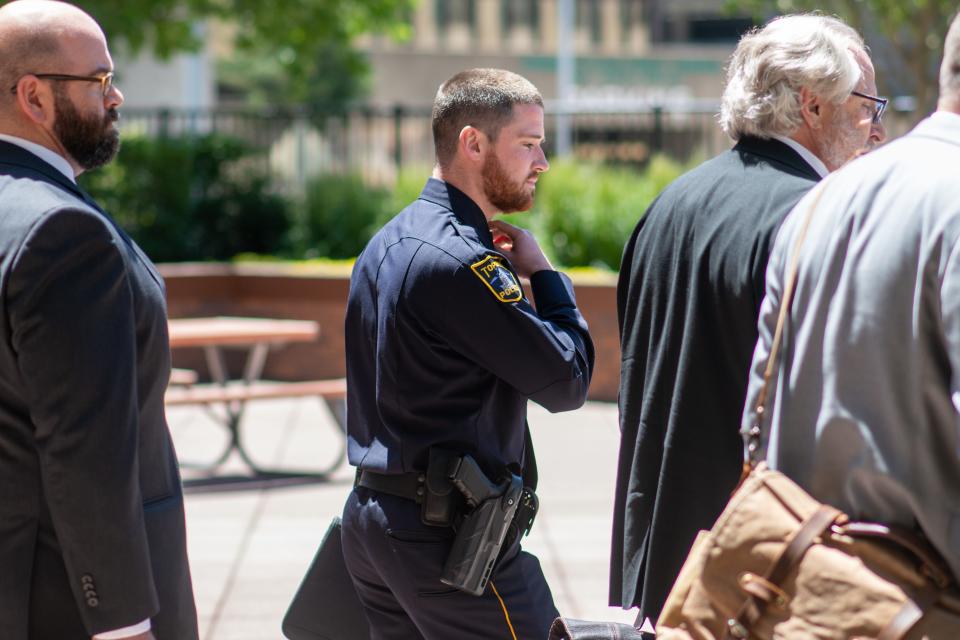 Topeka Police Officer Chris Janes walks Thursday out of the federal courthouse in Topeka after a jury ruled that Janes did not violate Timothy Harris’ Constitutional rights when he arrested him on Jan. 23, 2018, in East Topeka.