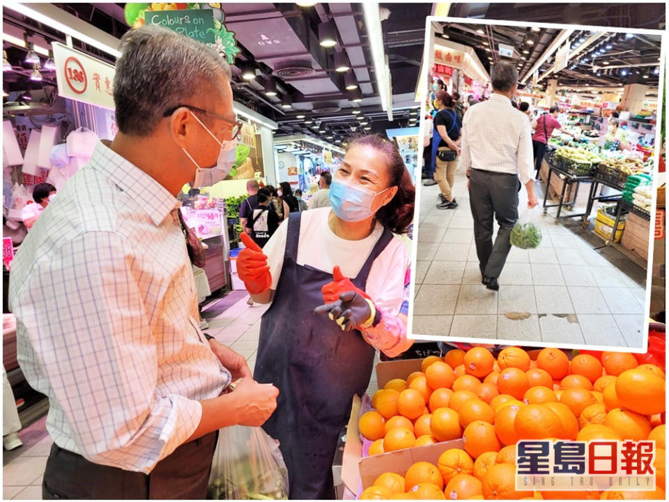 陳茂波趁逛街市買餸時與商戶聊天，了解經濟市道，以至電子支付的應用情況。網圖