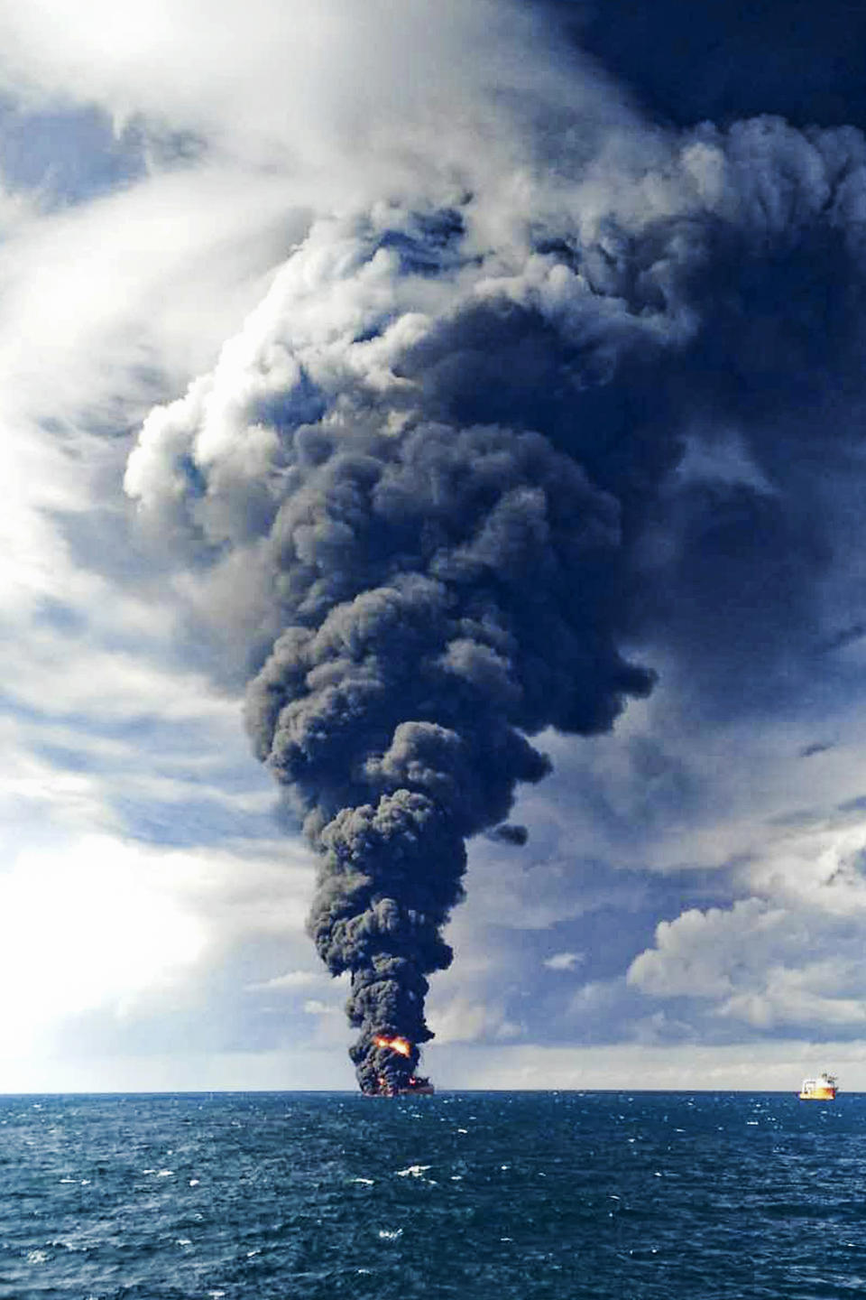 <p>Smokes and frames from the burning Iranian oil tanker Sanchi in the East China Sea off the eastern coast of China, Jan. 14, 2018. The fire from the sunken Iranian tanker ship in the East China Sea has burned out, a Chinese transport ministry spokesman said Monday, although concerns remain about possible major pollution to the sea bed and surrounding waters. (Ministry of Transport via AP) </p>