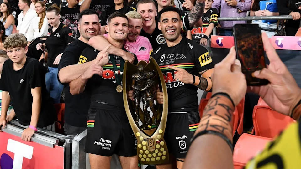 Tyrone May (pictured right) and Nathan Cleary (pictured left) celebrate the Panthers' grand final win.