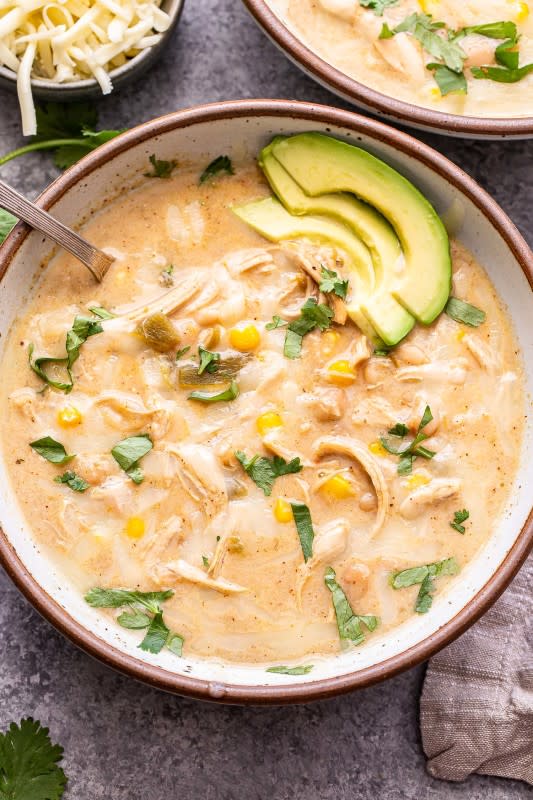 <p>Recipe Runner</p><p>This slow cooker creamy green chile chicken enchilada soup has all the wonderful flavor of the enchiladas without all the work!</p><p><strong>Get the recipe: <a href="https://reciperunner.com/slow-cooker-creamy-green-chile-chicken-enchilada-soup/" rel="nofollow noopener" target="_blank" data-ylk="slk:Slow Cooker Creamy Green Chile Chicken Enchilada Soup;elm:context_link;itc:0;sec:content-canvas" class="link rapid-noclick-resp">Slow Cooker Creamy Green Chile Chicken Enchilada Soup</a></strong></p>