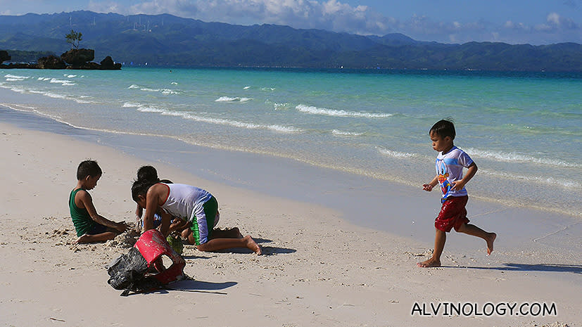 Kids playing by the beach