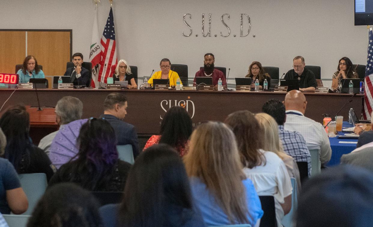 The Stockton Unified School District board approve the board's response to the San Joaquin County grand jury report during a regular board meeting at the districts headquarters in downtown Stockton on Aug. 23.