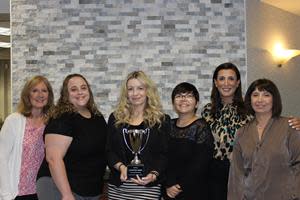 Unity Bank has been awarded the Raymond James Community Bankers Cup for 2022. Pictured with the award are Unity’s Clinton branch team (from left) Cynthia O’Keefe, Lisa Steele, Tracy Tortorello, Jadzia Card, Lauren Clark, and Armine Schonmon.