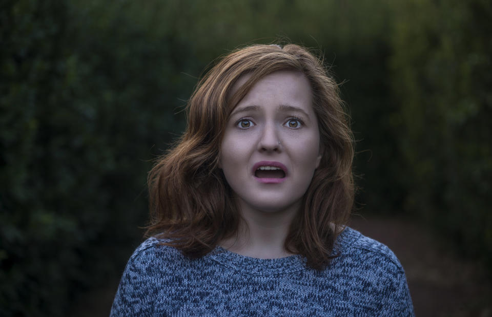 This woman clearly just said "ope" in a spooky forest. (Photo: Ismailciydem via Getty Images)