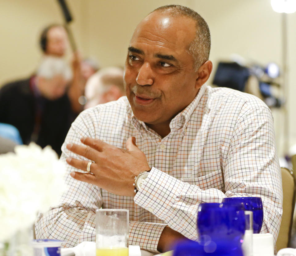 Cincinnati Bengals head coach Marvin Lewis answers questions during the AFC head coaches breakfast at the NFL football annual meeting in Orlando, Fla., Tuesday, March 25, 2014. (AP Photo/John Raoux)