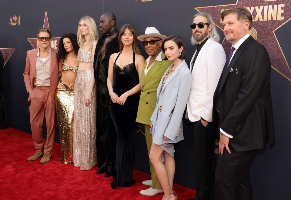 The cast of 'Maxxxine' pose at the world premiere at TCL Chinese Theatre