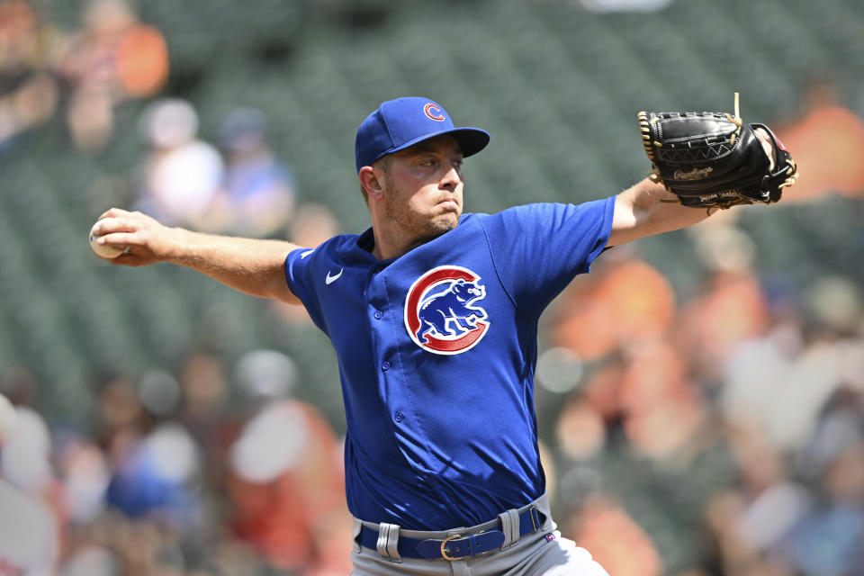 CORRECTS DAY OF WEEK TO THURSDAY - Chicago Cubs pitcher Adrian Sampson throws against the Baltimore Orioles in the first inning of a baseball game, Thursday, Aug. 18, 2022, in Baltimore. (AP Photo/Gail Burton)