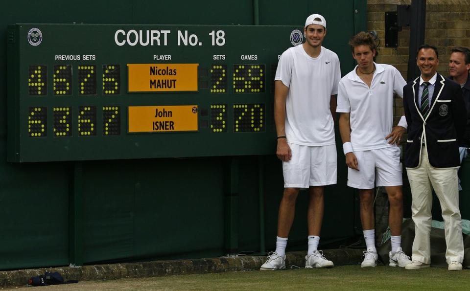 John Isner and Nicolas Mahut after their gruelling encounter in 2010 (GLYN KIRK/AFP/Getty Images)