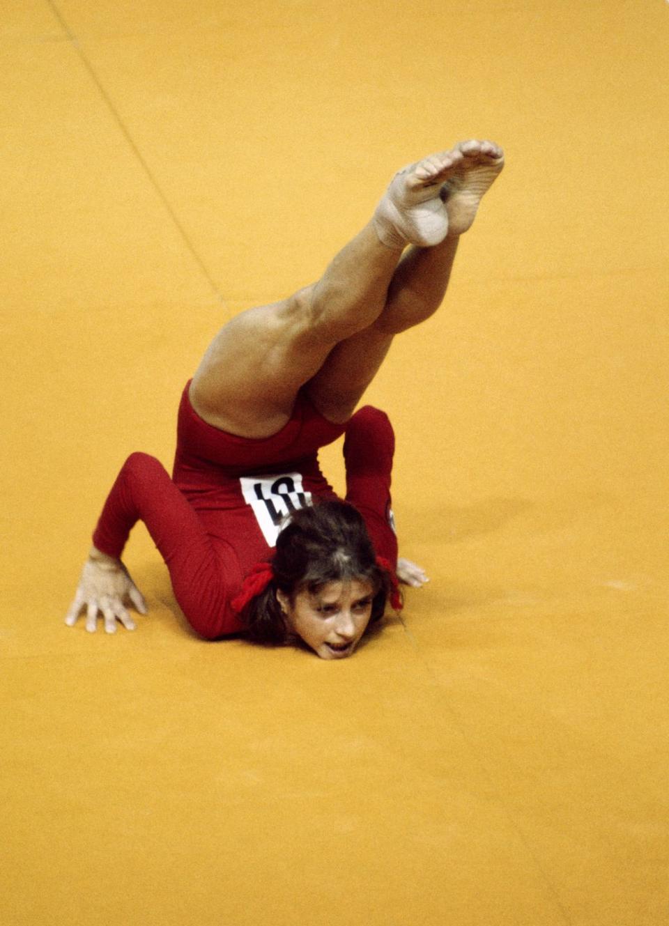 <p>1976: The year Romanian Nadia Comaneci became the first gymnast to score a perfect 10 in an Olympic gymnastics event. It was <em>such</em> an unprecedented feat that they didn't even have a way to relay what had happened, with the score registering as "1.00" on the electronic scoreboard because 9.99 was the board's limit!</p>