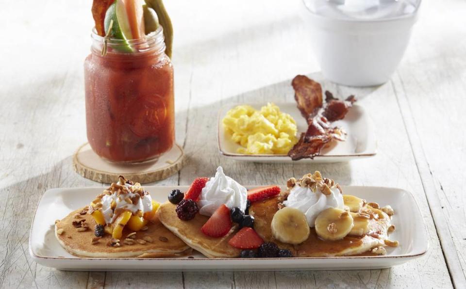 A pancake platter and a Blood Mary at Another Broken Egg Cafe. This upscale breakfast, brunch and lunch spot is coming to The Century Market Plaza Phase II at 810 Ga. 96 in Warner Robins.