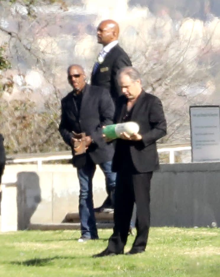 AG_161006 - - Los Angeles, CA - Billie Lourd looks devastated as Todd Fisher holds Carrie Fisher's ashes as Debbie Reynolds and Carrie Fishers' funeral. Billie, the daughter of Carrie Fisher, is joined by other friends and family as they conduct the funeral service at Forest Memorial Park, Hollywood Hills. AKM-GSI 6 JANUARY 2017 To License These Photos, Please Contact : Maria Buda (917) 242-1505 mbuda@akmgsi.com or Mark Satter (317) 691-9592 msatter@akmgsi.com sales@akmgsi.com