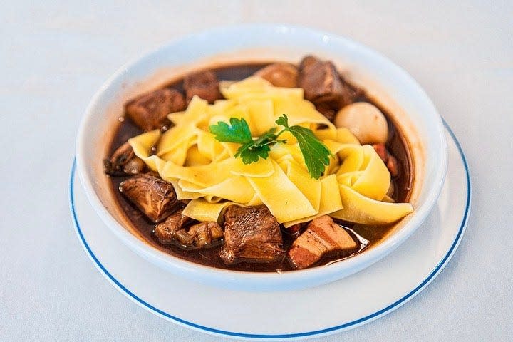 The beef bourguignon at La Goulue is slow-cooked and served over pappardelle noodles.