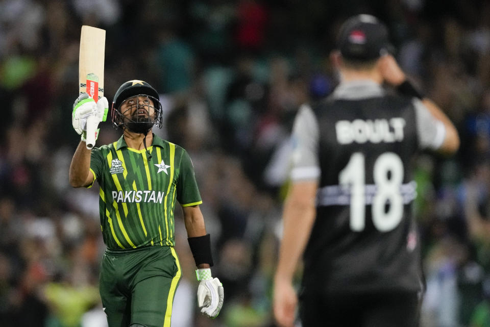 Pakistan's Babar Azam gestures with his bat on scoring 50 runs during the T20 World Cup cricket semifinal between New Zealand and Pakistan in Sydney, Australia, Wednesday, Nov. 9, 2022. (AP Photo/Rick Rycroft)