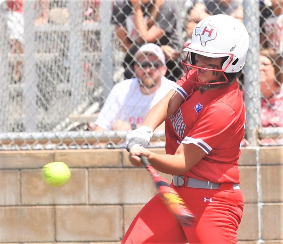 Hermleigh freshman Hailey Minton hits a grand-slam with two outs in the fourth inning. Her second career homer gave the Lady Cardinals an 8-1 lead over Eula.