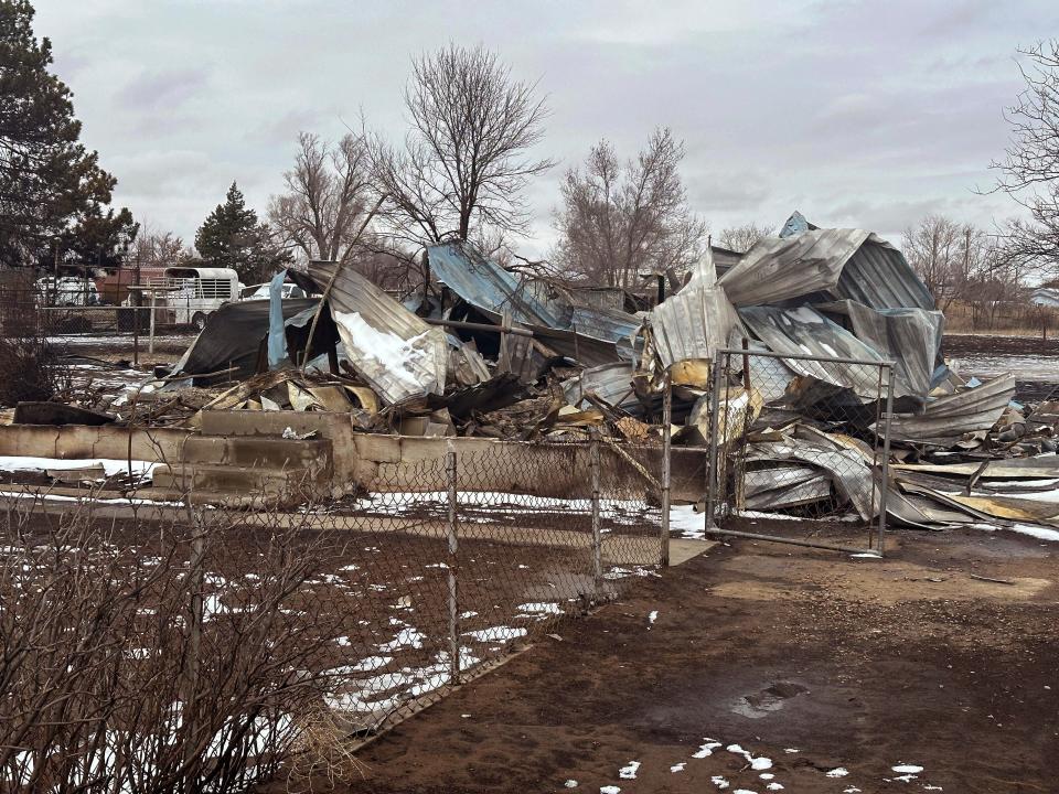 Snow covers a home that was destroyed by the Smokehouse Creek Fire in Stinnett, Texas on Feb. 29, 2024. The wildfire spreading across the Texas Panhandle became the largest in state history.(AP Photo/Ty O'Neil) ORG XMIT: RPTO110