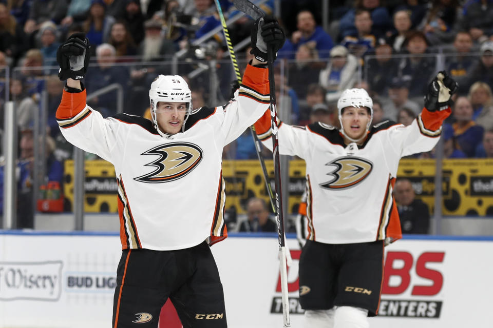 Anaheim Ducks' Max Comtois, left, celebrates after scoring as teammate Hampus Lindholm also celebrates during the first period of an NHL hockey game against the St. Louis Blues Monday, Jan. 13, 2020, in St. Louis. (AP Photo/Jeff Roberson)
