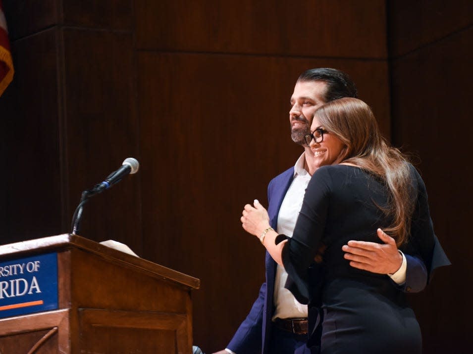 Donald Trump Jr. and Kimberly Guilfoyle speak at the University of Florida in October 2019.