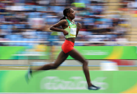 Almaz Ayana of Ethiopia competes on her way to setting a new world record in the woman's 10,000m. REUTERS/Alessandro Bianchi