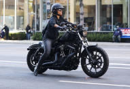 <p>Halle Berry takes her new Harley Davidson motorcycle for a spin around Beverly Hills on Tuesday.</p>