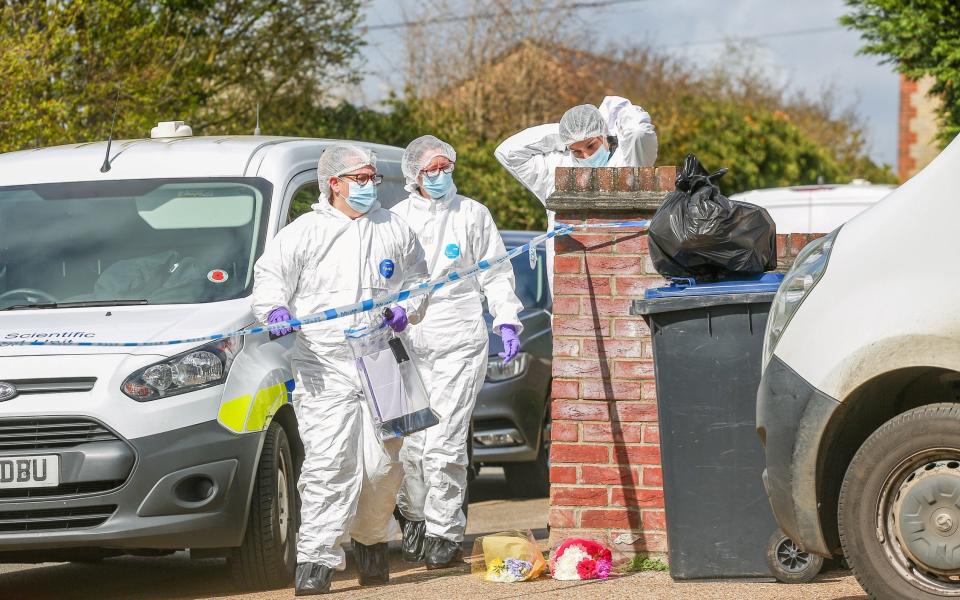 Forensics at the scene in Sutton, Cambridgeshire on Thursday - Joseph Walshe /SWNS