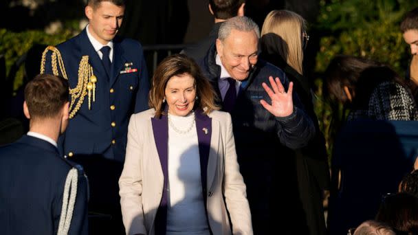 PHOTO: House Speaker Nancy Pelosi and Senate Majority Leader Chuck Schumer arrive before President Joe Biden speaks during a bill signing ceremony for the Respect for Marriage Act, Dec. 13, 2022, on the South Lawn of the White House. (Andrew Harnik/AP)