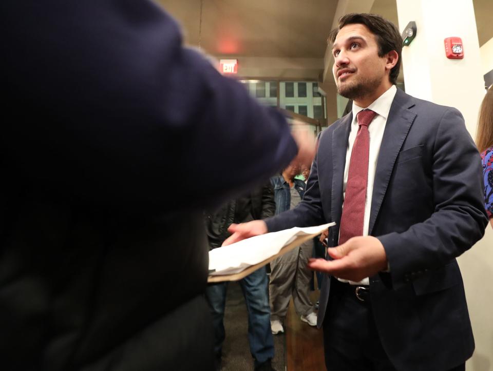 Shammas Malik, Akron mayor-elect, talks to a supporter at the election night party at The KnightStage at the Civic in Akron on Tuesday.