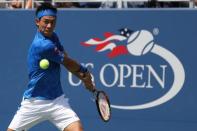 Aug 30, 2016; New York, NY, USA; Kei Nishikori of Japan hits a backhand against Benjamin Becker of Germany (not pictured) on day two of the 2016 U.S. Open tennis tournament at USTA Billie Jean King National Tennis Center. Geoff Burke-USA TODAY Sports