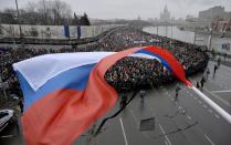 Russia's opposition supporters march in memory of murdered Kremlin critic Boris Nemtsov in central Moscow on March 1, 2015