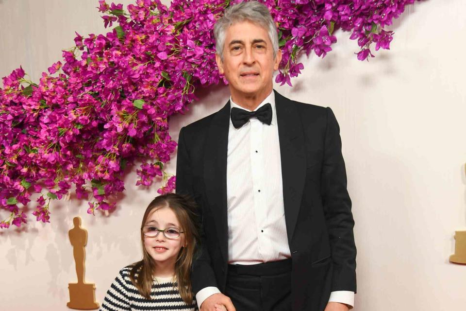 <p>Alberto Rodriguez/Variety via Getty</p> Alexander Payne and daughter at 2024 Oscars