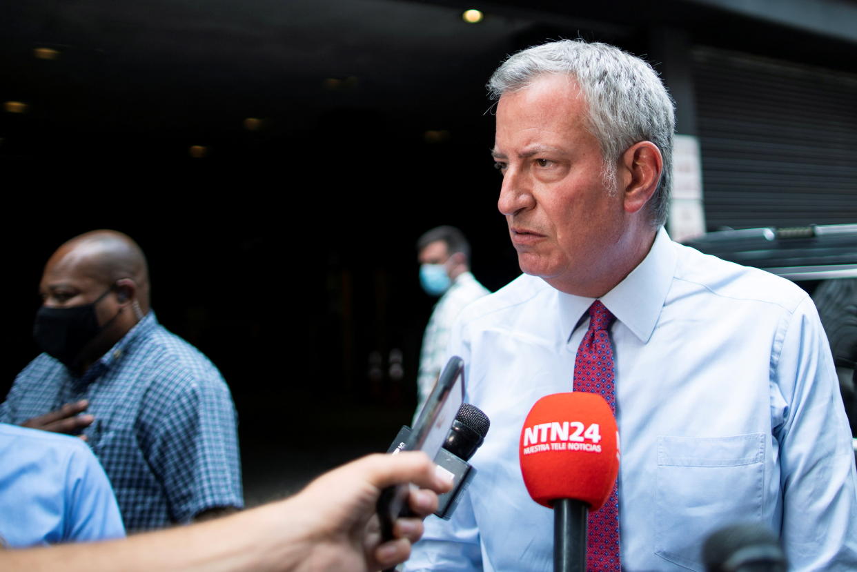 New York City Mayor Bill de Blasio gives his remarks to the media regarding a probe about Governor Cuomo, in New York City, August 3, 2021. REUTERS/Eduardo Munoz