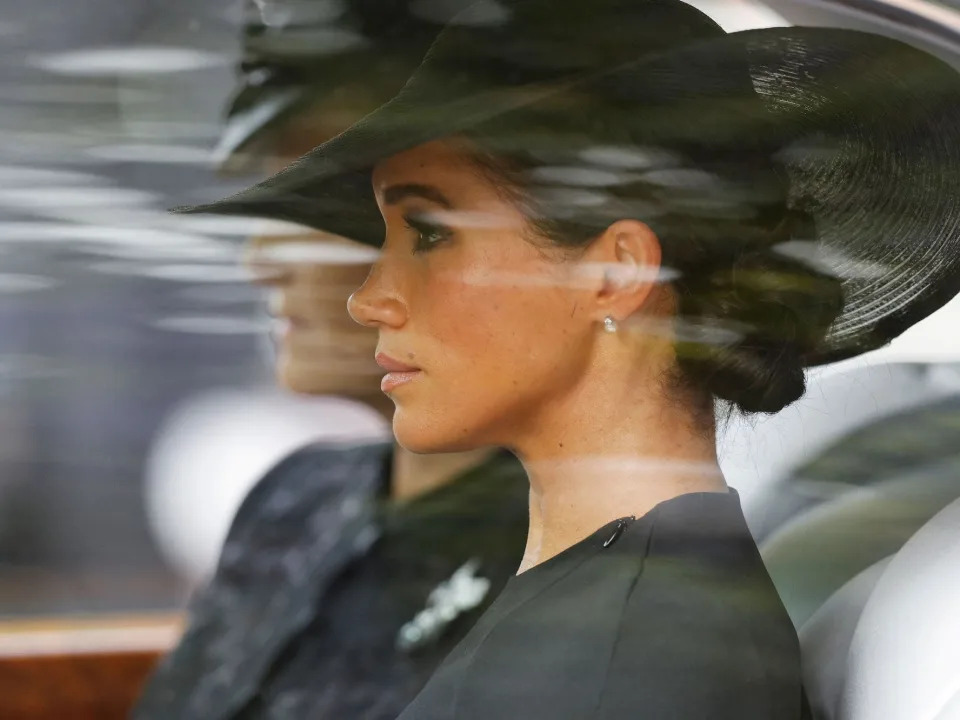 Meghan Markle in a car as she trails behind Queen Elizabeth&#39;s casket.