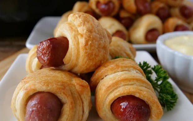 <p><a href="https://www.greatgrubdelicioustreats.com/pigs-in-a-blanket-air-fryer-recipe/" rel="nofollow noopener" target="_blank" data-ylk="slk:Great Grub, Delicious Treats;elm:context_link;itc:0;sec:content-canvas" class="link ">Great Grub, Delicious Treats</a></p>