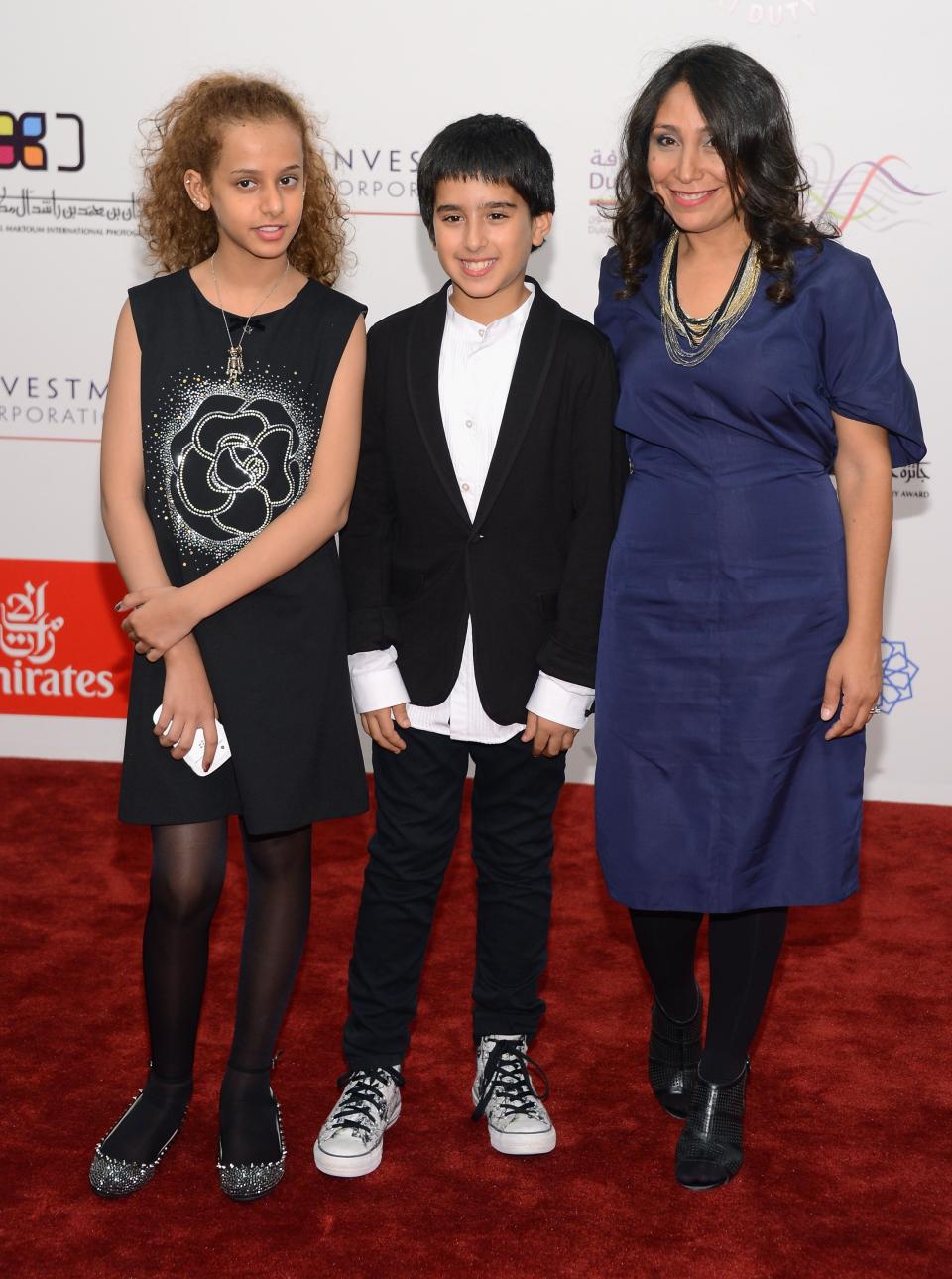 DUBAI, UNITED ARAB EMIRATES - DECEMBER 12: Actors Waad Mohammed, Abdulrahman al Guhani and director Haifaa Al Mansour attend the "Wadjda" premiere during day four of the 9th Annual Dubai International Film Festival held at the Madinat Jumeriah Complex on December 12, 2012 in Dubai, United Arab Emirates. (Photo by Andrew H. Walker/Getty Images for DIFF)