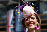 Sarah Soulsby from London chose a colourful fascinator on day four paired with some equally fabulous earrings. <em>[Photo: PA]</em>