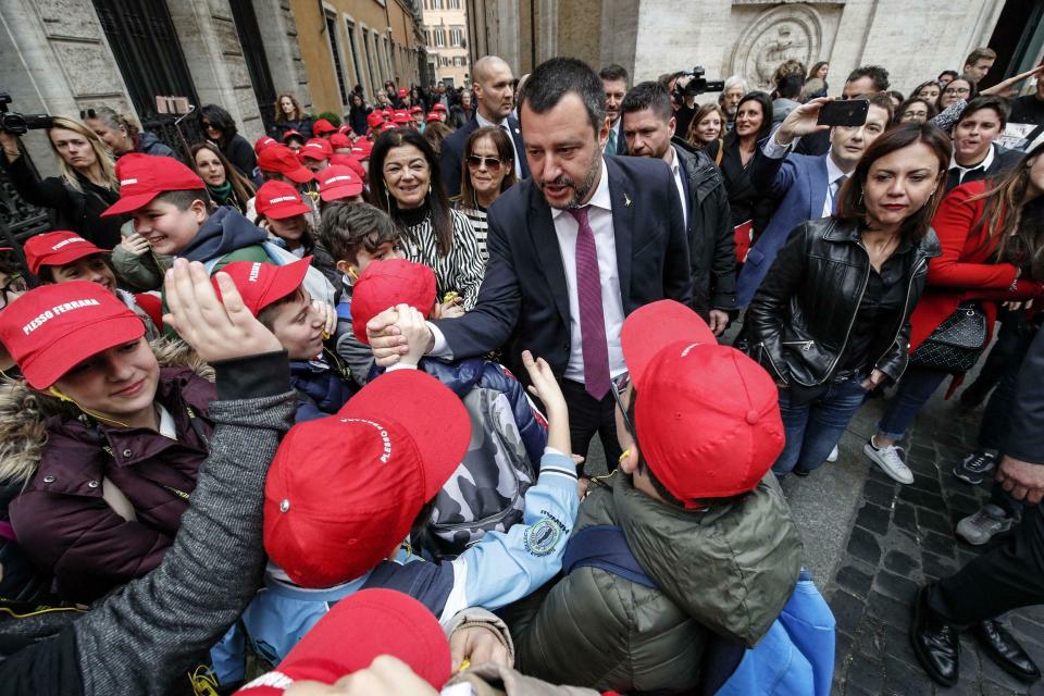Italian Deputy Premier and Interior Minister Matteo Salvini greets a school group outside the Senate in Rome, Friday, March 8, 2019. Italy's coalition government is fraying over the stalled high-speed rail line to France. While the League insists it go ahead, the 5-Star Movement is refusing to fund the next phase until the whole deal is renegotiated. Five-Star leader Luigi Di Maio warned Friday it would be ridiculous for the government to fall over the dispute, as he rebuked fellow deputy premier and League leader Matteo Salvini. (Giuseppe Lami/ANSA via AP)