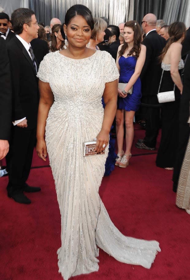 <p>Spencer’s hand-beaded Tadashi Shoji gown took <a href="https://www.instyle.com/news/octavia-spencers-oscars-dress-1000-hours-work-10-people" rel="nofollow noopener" target="_blank" data-ylk="slk:1,000 hours of work by 10 people;elm:context_link;itc:0;sec:content-canvas" class="link ">1,000 hours of work by 10 people</a>. She got to show it off a second time when she walked onstage to accept her award for Best Actress in a Supporting Role for <em>The Help</em>.</p>