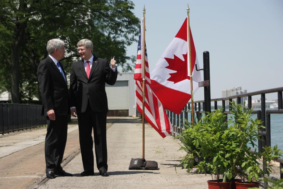 Prime Minister Stephen Harper and Michigan Gov. Rick Snyder speak in Windsor, Ontario, Canada  on Friday, June 15, 2012, ahead of an announcement for a new $1-billion bridge connecting the city with Detroit. (AP Photo/The Canadian Press, Colin Perkel)