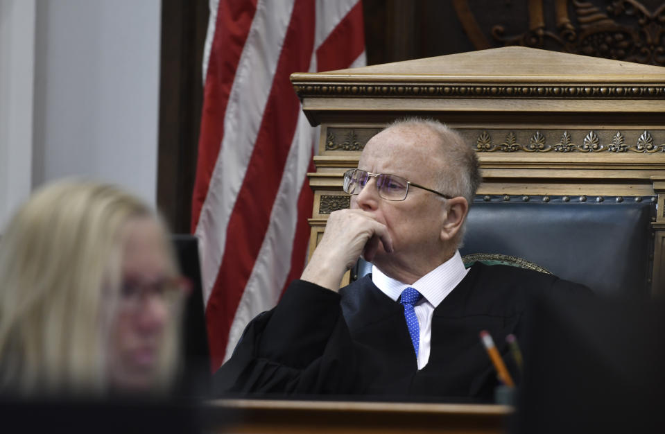 Judge Bruce Schroeder watches video played during Koerri Washington's testimony during Kyle Rittenhouse's trial at the Kenosha County Courthouse in Kenosha, Wis., on Wednesday, Nov. 3, 2021. Rittenhouse is accused of killing two people and wounding a third during a protest over police brutality in Kenosha, last year. (Sean Krajacic/The Kenosha News via AP, Pool)