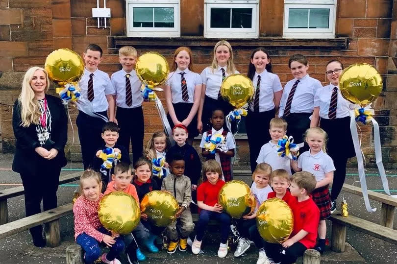 Williamsburgh Primary School, Paisley, receive good report from inspection as they hold gold balloons aloft